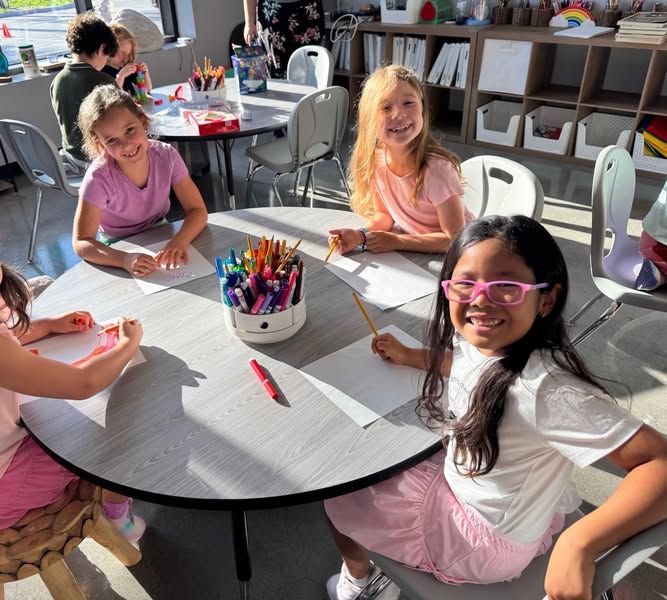 Discovery Pre-K4 students learning together in their classroom